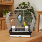 Vogelkäfig Vogelheim Chrom/Schwarz für Sittiche 57,5x33,5x55 cm auf einem Schrank mit zwei Wellensittichen im Käfig