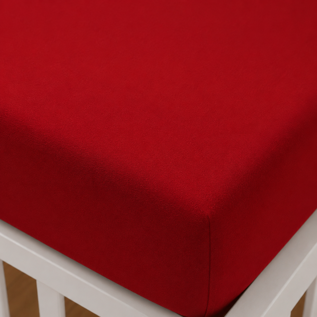 Nahaufnahme einer Ecke vom 2er Set Baby Jersey Spannbetttuch 60x120 cm - 70x140 cm Rot Baumwolle