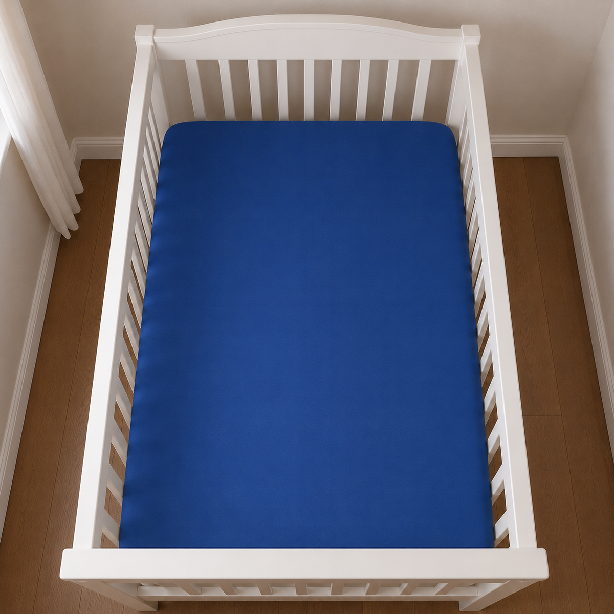 2er Set Baby Jersey Spannbetttuch 60x120 cm - 70x140 cm Blau Baumwolle aus der Vogelperspektive in einem Babybett dargestellt