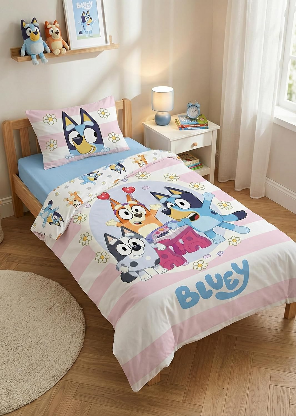 Bluey, Bingo & Muffin Baby Bettwäsche Set 2 tlg. 100x135 cm Baumwolle aufgezogen auf einem Bett