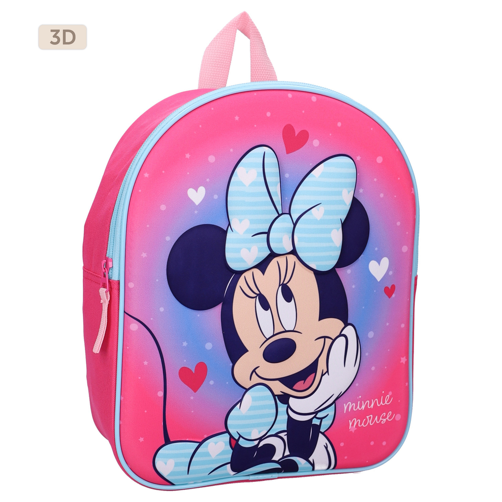 Schräge Ansicht des rosa-pinken Minnie Mouse Kinderrucksacks verdeutlicht den dreidimensionalen 3D-Effekt des Minnie Maus Motivs auf der Vorderseite sowie die hellblauen Paspeln an den Rändern.