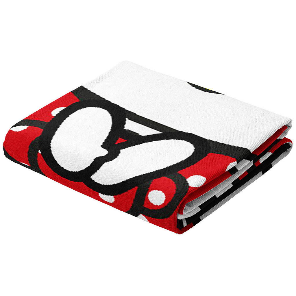 Gefaltetes Handtuch mit Hello‑Kitty‑Motiv, roter Schleife mit weißen Punkten und schwarzer Kontur auf rot‑weißem Hintergrund.