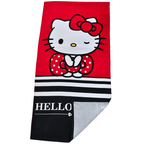 Handtuch mit Hello Kitty, roter Schleife und schwarz‑weißen Streifen. Unten weißer „HELLO KITTY“ Schriftzug auf schwarzem Feld.
