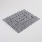 Freigestellte Produktansicht von der Badematte Badteppich Duschvorleger 50 x 60 cm Rechteckig Hellgrau
